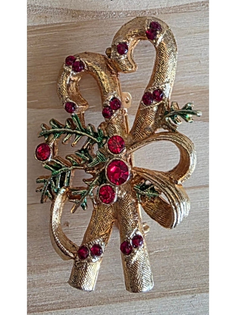 Gold-Tone Candy Cane Holiday Brooch with Red Crystals
